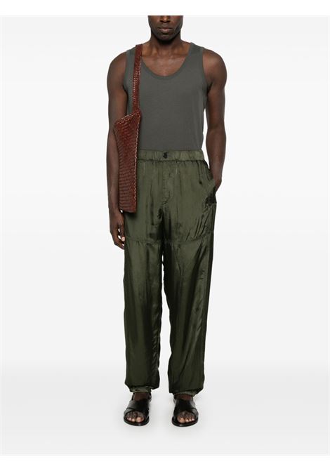 Pantaloni con finitura satinata pebble in verde Dries van noten - uomo DRIES VAN NOTEN | 2510209321427606